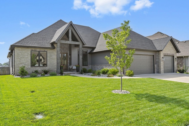 858 E Edenmore Cir, Nixa, MO 65714 - view of front of property with a garage, brick siding, a front yard, and a shingled roof