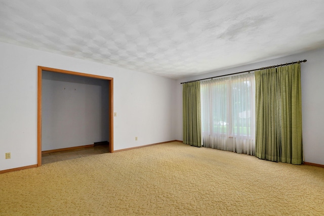 3066 E Lomita St, Springfield, MO 65804 - empty room with light carpet and a textured ceiling