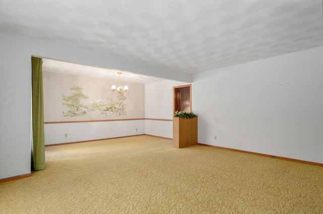 3066 E Lomita St, Springfield, MO 65804 - carpeted empty room with a chandelier and baseboards