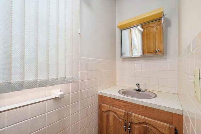 3066 E Lomita St, Springfield, MO 65804 - bathroom featuring vanity and tile walls