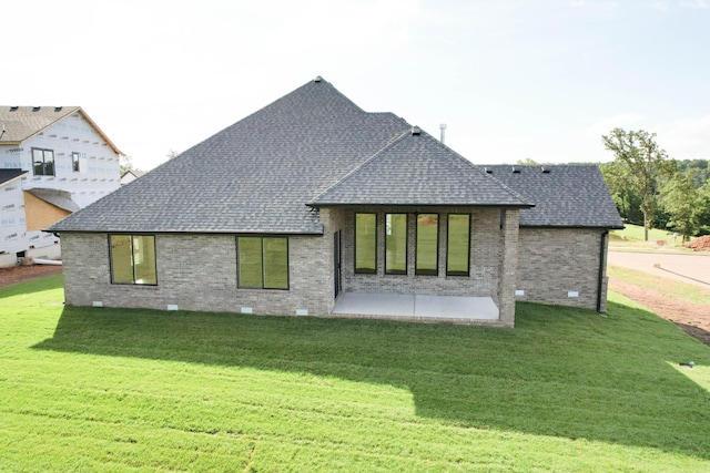 6059 S Clay Ave, Springfield, MO 65810 - back of house featuring a shingled roof, brick siding, and crawl space