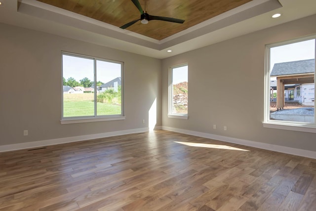 6059 S Clay Ave, Springfield, MO 65810 - spare room with a raised ceiling, a ceiling fan, wood finished floors, wood ceiling, and recessed lighting