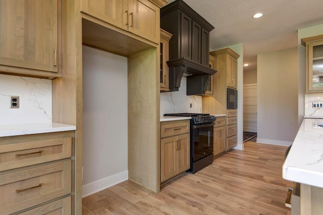 6059 S Clay Ave, Springfield, MO 65810 - kitchen featuring black appliances, light countertops, decorative backsplash, and recessed lighting