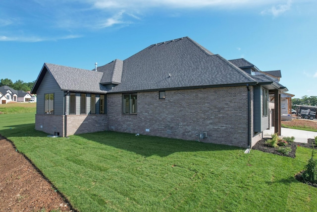 6059 S Clay Ave, Springfield, MO 65810 - back of property with brick siding, a yard, and a shingled roof