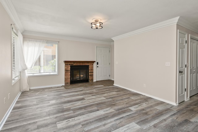 3440 S Delaware Ave Unit 114, Springfield, MO 65804 - unfurnished living room featuring wood finished floors, ornamental molding, and a fireplace
