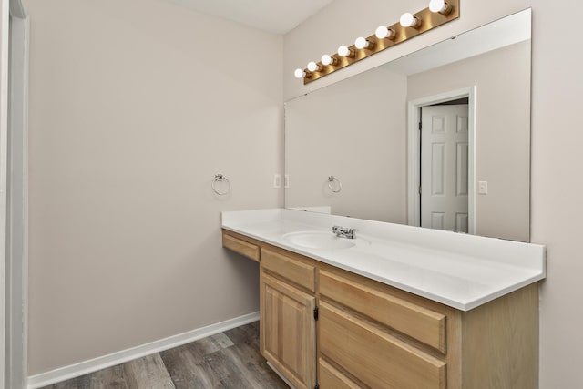 3440 S Delaware Ave Unit 114, Springfield, MO 65804 - bathroom featuring vanity and wood finished floors