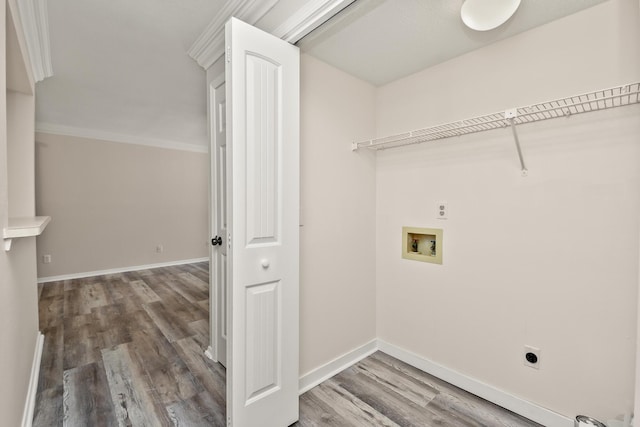3440 S Delaware Ave Unit 114, Springfield, MO 65804 - washroom featuring electric dryer hookup, wood finished floors, washer hookup, and crown molding