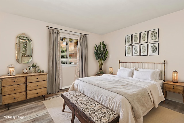 3440 S Delaware Ave Unit 114, Springfield, MO 65804 - bedroom with light wood-type flooring