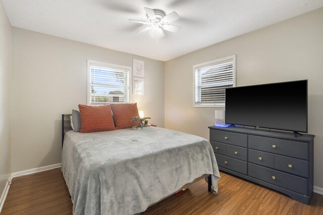2558 S Nettleton Ave, Springfield, MO 65807 - bedroom with wood finished floors and a ceiling fan