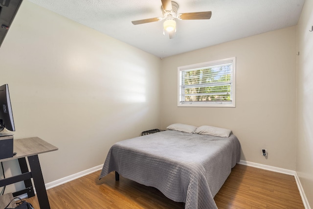 2558 S Nettleton Ave, Springfield, MO 65807 - bedroom featuring wood finished floors and a ceiling fan