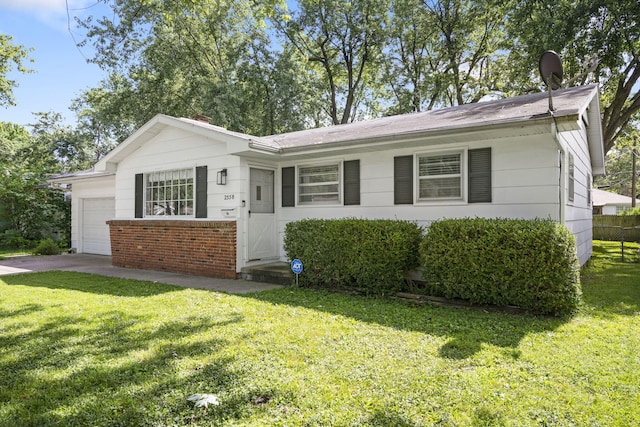 2558 S Nettleton Ave, Springfield, MO 65807 - ranch-style home with an attached garage and concrete driveway