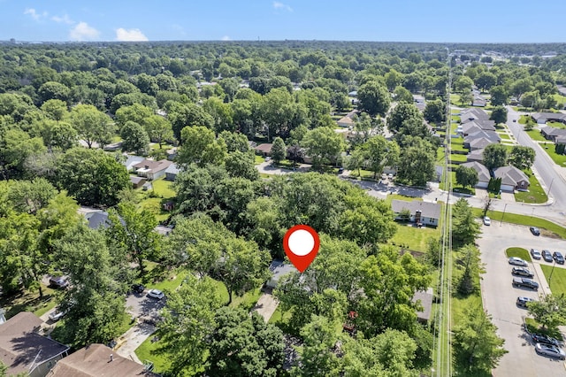 2558 S Nettleton Ave, Springfield, MO 65807 - aerial overview of property's location with a heavily wooded area