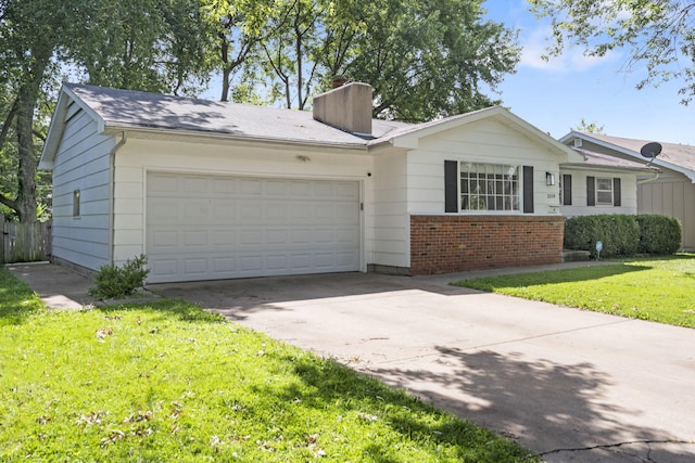 2558 S Nettleton Ave, Springfield, MO 65807 - ranch-style home with a chimney, a garage, concrete driveway, and brick siding