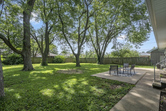 2558 S Nettleton Ave, Springfield, MO 65807 - fenced backyard with a patio area