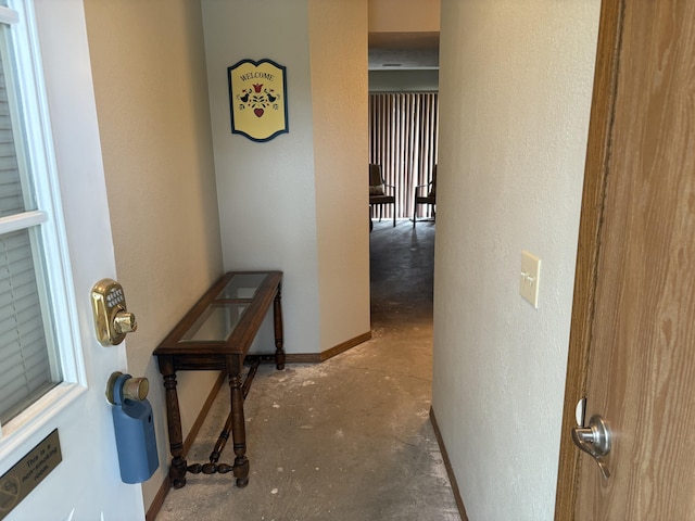 3 Memory Ln Unit 1, Branson, MO 65616 - corridor with unfinished concrete floors and a textured wall