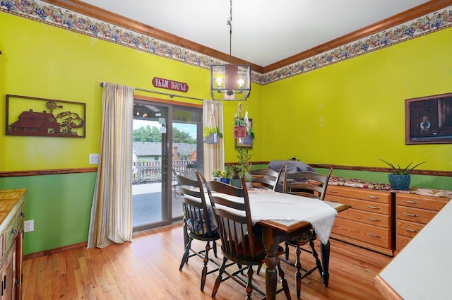 311 Northview Rd, Nixa, MO 65714 - dining area with a chandelier and light wood-style flooring