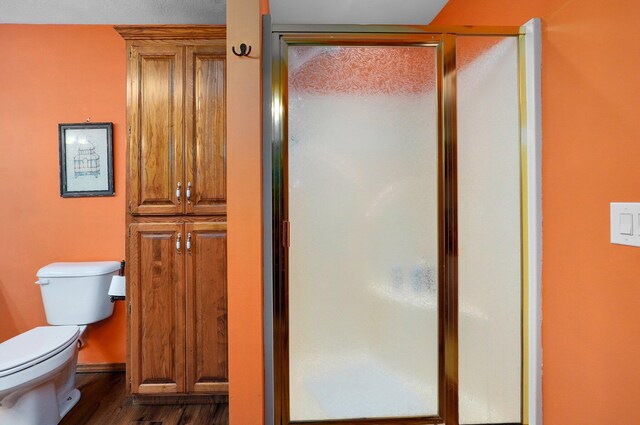 311 Northview Rd, Nixa, MO 65714 - bathroom with wood finished floors and a stall shower