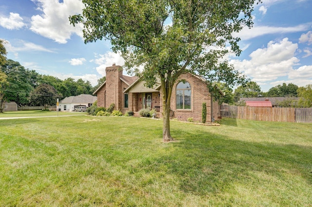 311 Northview Rd, Nixa, MO 65714 - view of front of home with brick siding and a chimney