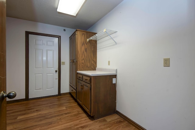 3501 E Cooper Blvd, Springfield, MO 65802 - washroom with wood finished floors and baseboards