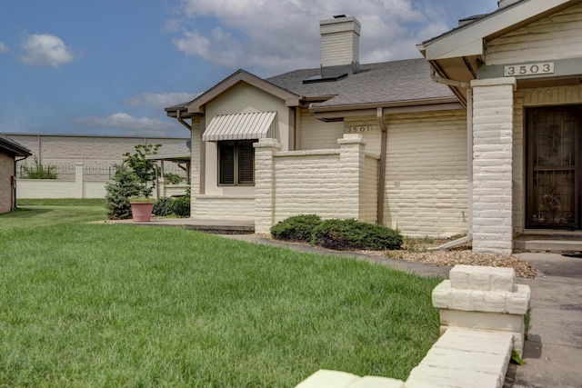 3501 E Cooper Blvd, Springfield, MO 65802 - back of house featuring a chimney, a shingled roof, and stone siding
