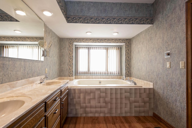 3501 E Cooper Blvd, Springfield, MO 65802 - bathroom with wood finished floors, a garden tub, and double vanity