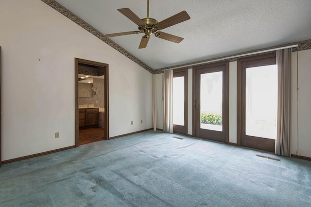 3501 E Cooper Blvd, Springfield, MO 65802 - carpeted spare room with vaulted ceiling and a ceiling fan