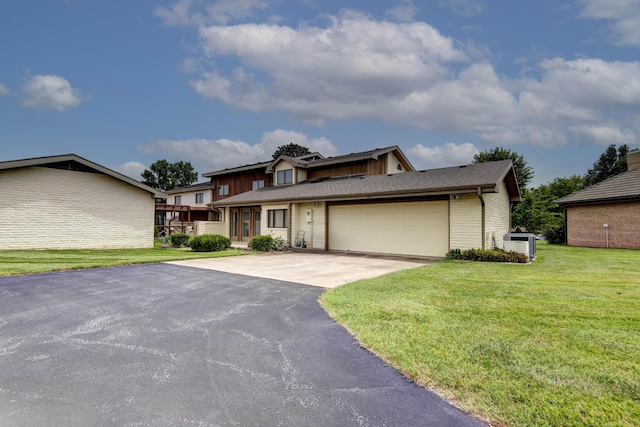 3501 E Cooper Blvd, Springfield, MO 65802 - view of front of property with driveway, a garage, a front lawn, and board and batten siding