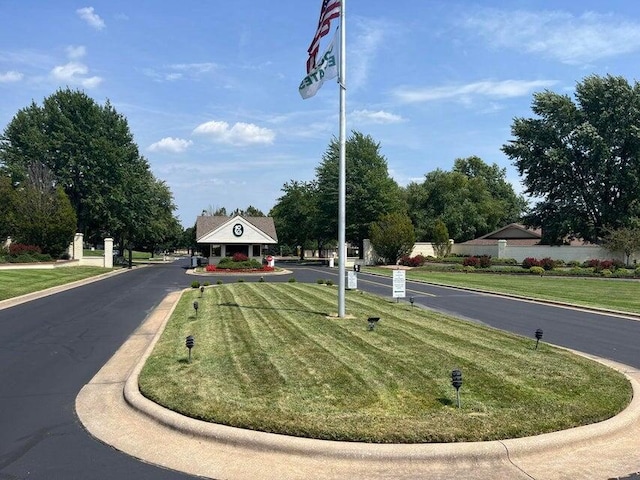 3501 E Cooper Blvd, Springfield, MO 65802 - view of asphalt road featuring curbs
