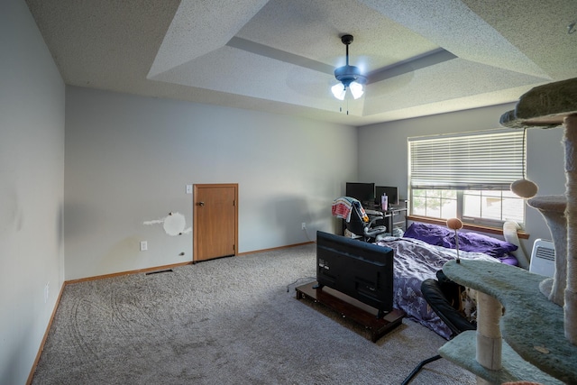 2981 W Highpoint St, Springfield, MO 65810 - bedroom with carpet floors, a raised ceiling, ceiling fan, and a textured ceiling