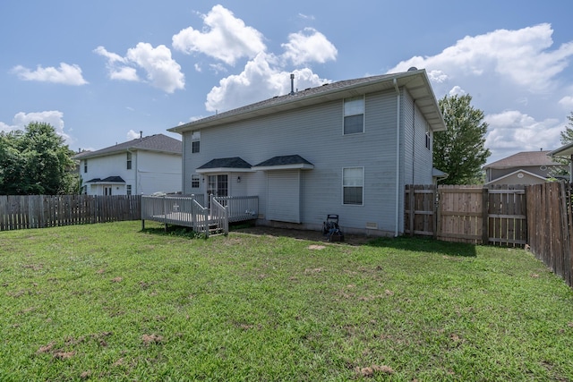 2981 W Highpoint St, Springfield, MO 65810 - rear view of house featuring a wooden deck and a fenced backyard