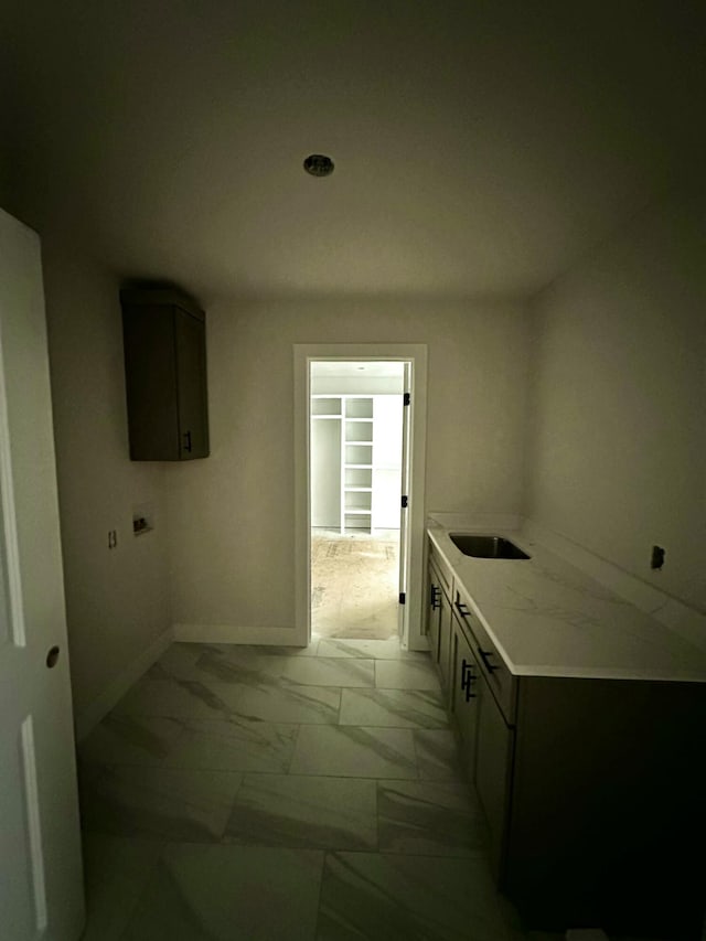 5569 E Wild Horse Dr, Springfield, MO 65802 - washroom with light marble finish floors and a sink