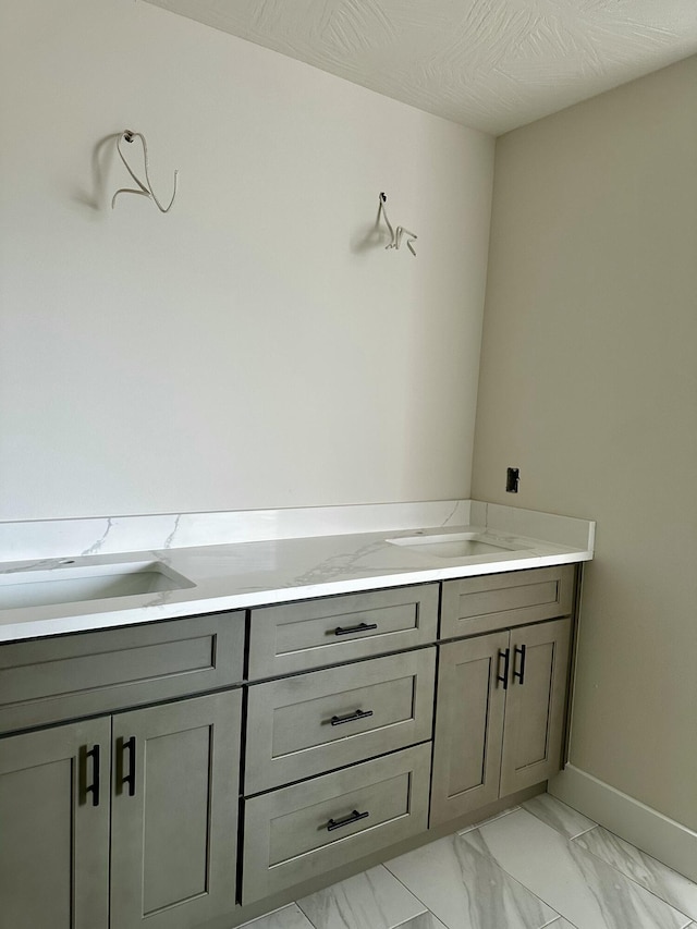 5569 E Wild Horse Dr, Springfield, MO 65802 - bathroom with marble look tiles and vanity