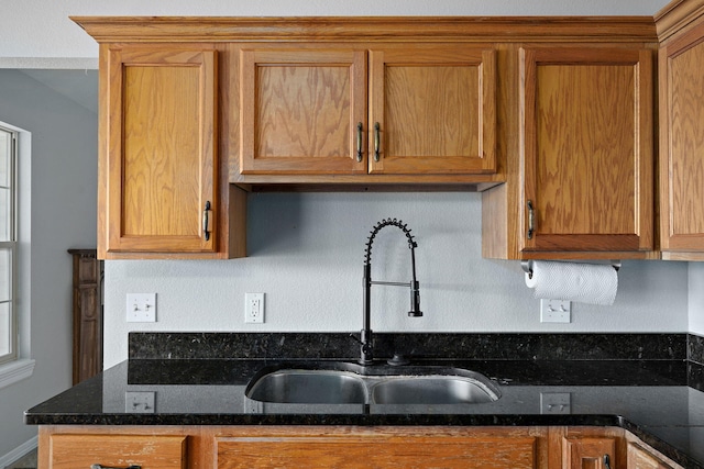 287 N Metzletein Rd, Billings, MO 65610 - kitchen with brown cabinets and dark stone countertops