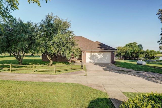 287 N Metzletein Rd, Billings, MO 65610 - view of front of house featuring brick siding, driveway, and a garage