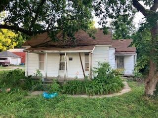 409 Locust St, Carl Junction, MO 64834 - view of front of home with a porch