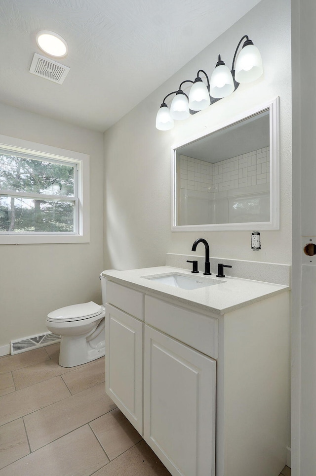 7208 N Farm Rd Unit 133, Springfield, MO 65803 - bathroom with toilet and vanity