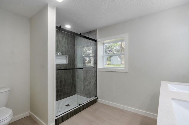 7208 N Farm Rd Unit 133, Springfield, MO 65803 - full bathroom with a shower stall, tile patterned floors, and double vanity