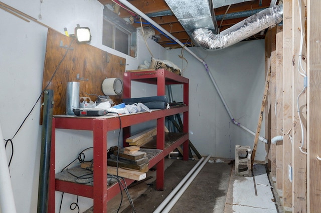 7208 N Farm Rd Unit 133, Springfield, MO 65803 - unfinished below grade area with a workshop area