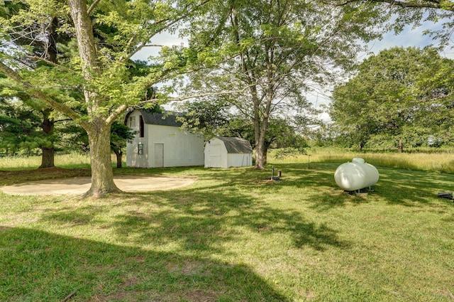 7208 N Farm Rd Unit 133, Springfield, MO 65803 - view of grassy yard featuring a storage shed