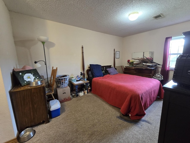 445 Monroe St, Thayer, MO 65791 - carpeted bedroom featuring a textured ceiling
