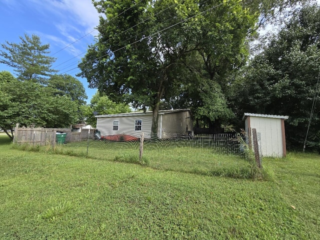 445 Monroe St, Thayer, MO 65791 - view of yard with a storage shed