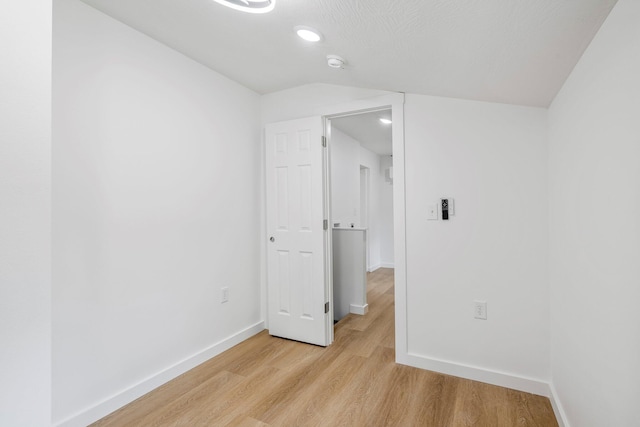 934 S New Ave, Springfield, MO 65806 - unfurnished bedroom with light wood-style floors, recessed lighting, and lofted ceiling