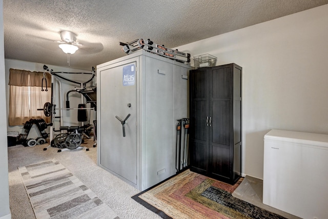 1908 Hazel St, Carthage, MO 64836 - interior space with a textured ceiling, carpet flooring, and ceiling fan
