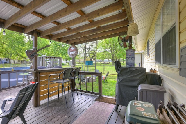 1908 Hazel St, Carthage, MO 64836 - deck with a lawn