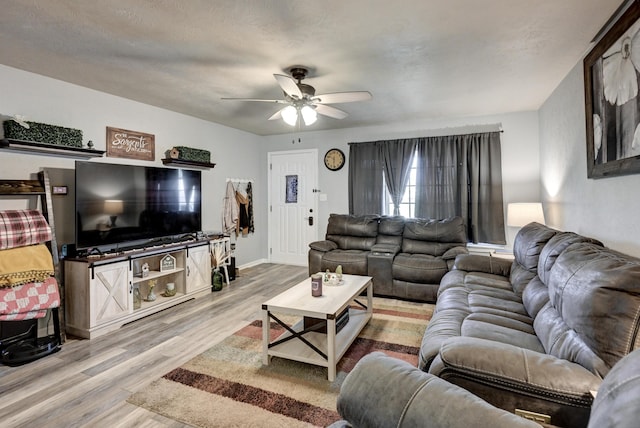 1908 Hazel St, Carthage, MO 64836 - living room featuring wood finished floors and a ceiling fan