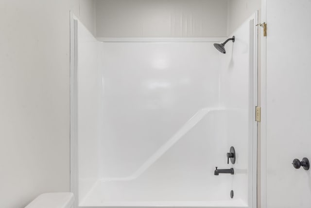 595 Johns Ford Rd, Sparta, MO 65753 - bathroom featuring toilet and shower / bath combination