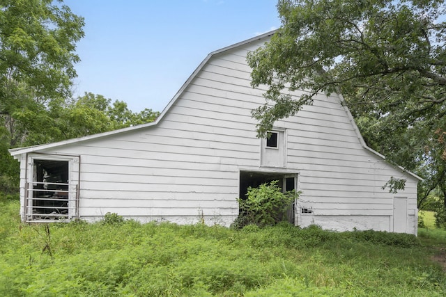 595 Johns Ford Rd, Sparta, MO 65753 - view of property exterior with a barn and an outbuilding