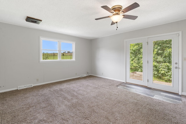595 Johns Ford Rd, Sparta, MO 65753 - empty room featuring carpet, ceiling fan, and a textured ceiling