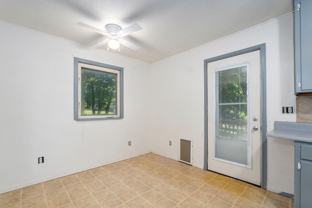 1311 S 9th St, Ozark, MO 65721 - unfurnished dining area featuring plenty of natural light and a ceiling fan