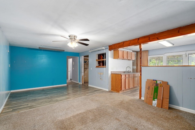 1311 S 9th St, Ozark, MO 65721 - unfurnished living room featuring a ceiling fan and light colored carpet